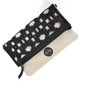Coco + Carmen Laser-cut faux leather and fabric clutch bag crossbody